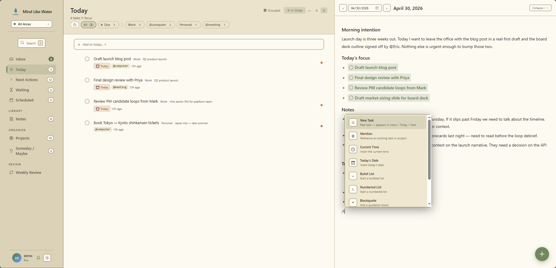 Daily page with inline task mentions and a slash-command menu open